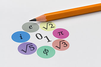 Mathematical symbols and pencil