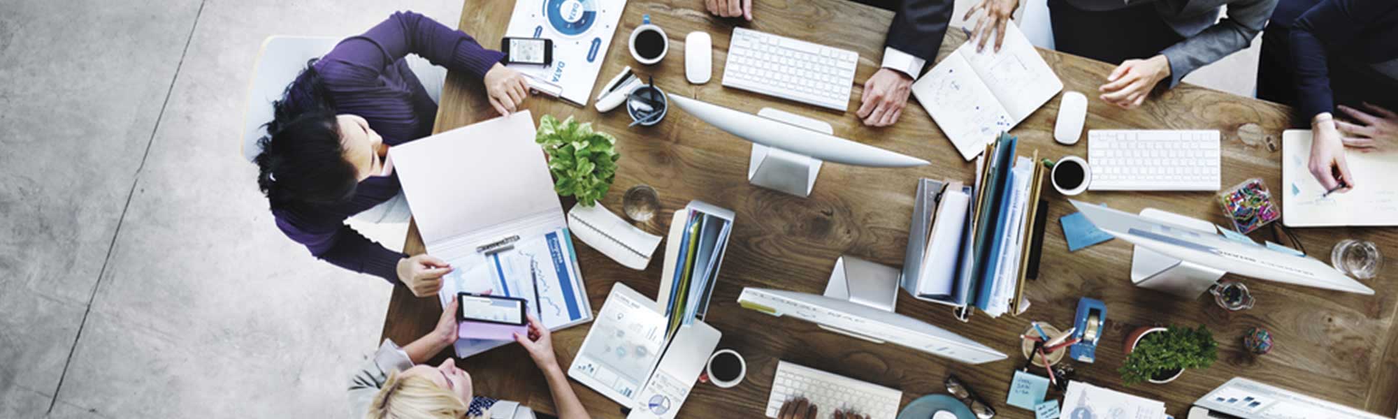 People at a large desk