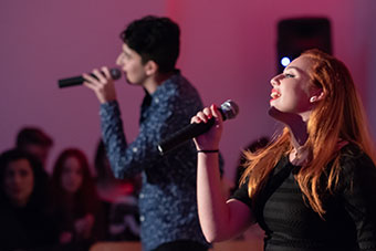 Two students singing