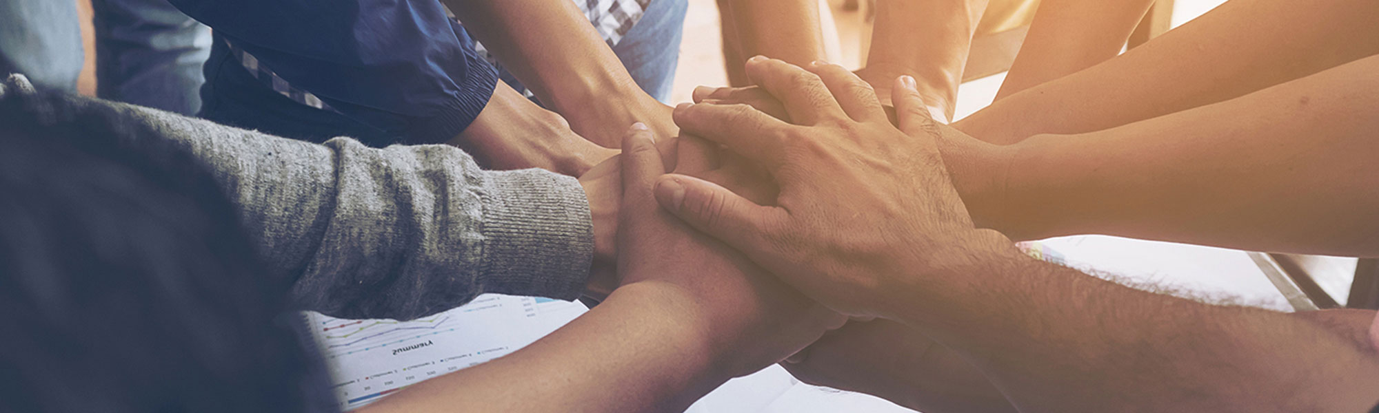 A group of people's hands to show collaboration