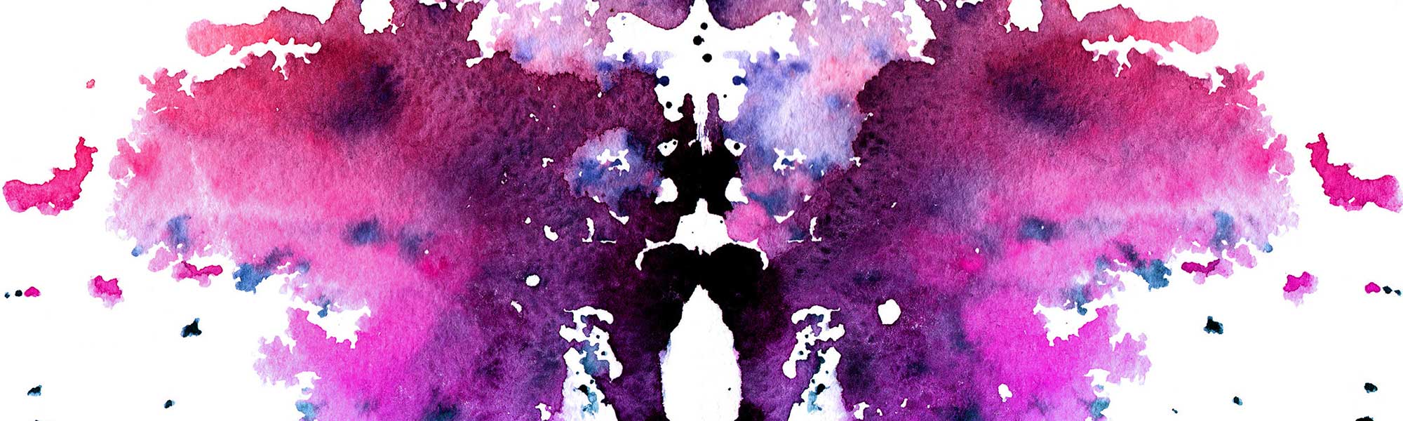 Red-purple watercolor symmetrical Rorschach blot